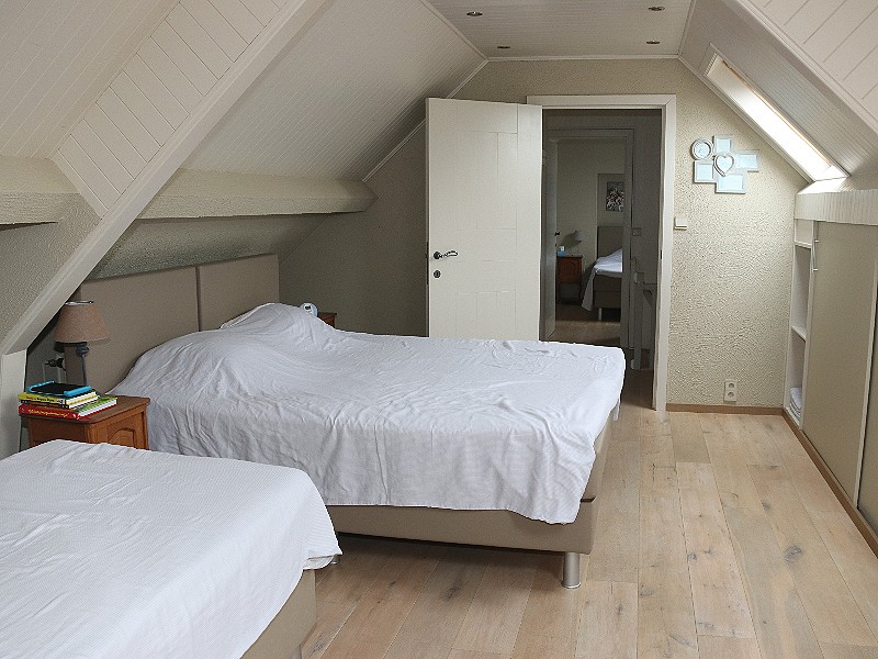Eén van de slaapkamers van boerderij Aan de Vleterbeke