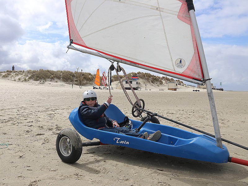 Strandzeilen in een tandem met een instructeur