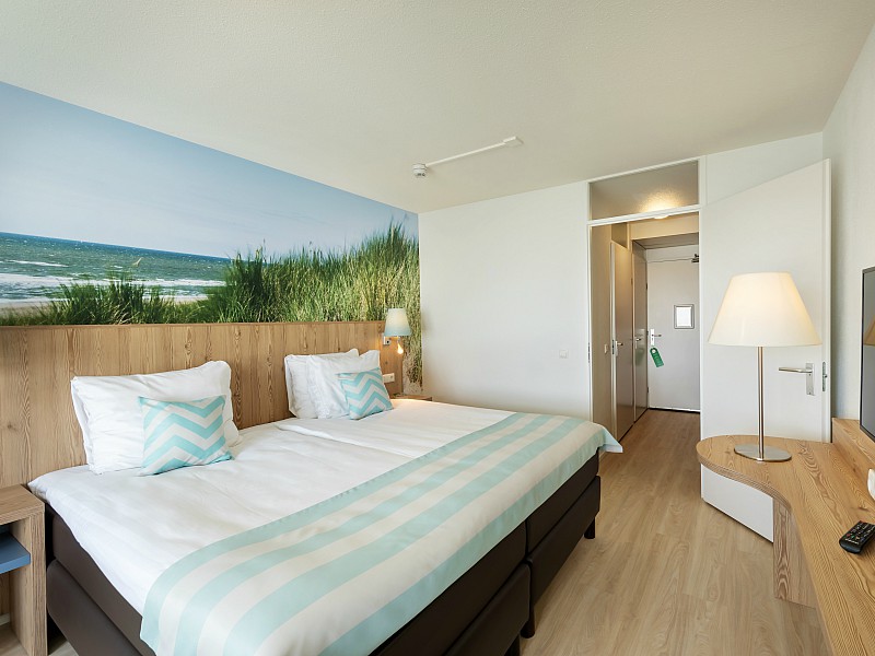 Hotelkamer met muren in stijl